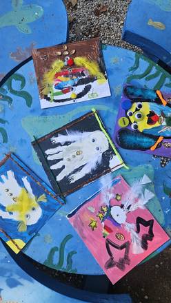 Bird collages drying on the table