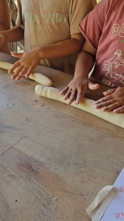 Rolling dough together by hand